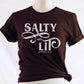 Salty And Lit Matthew 5:13-14 bible verse funny Christian T-Shirt design printed in white on soft mocha brown tee for women