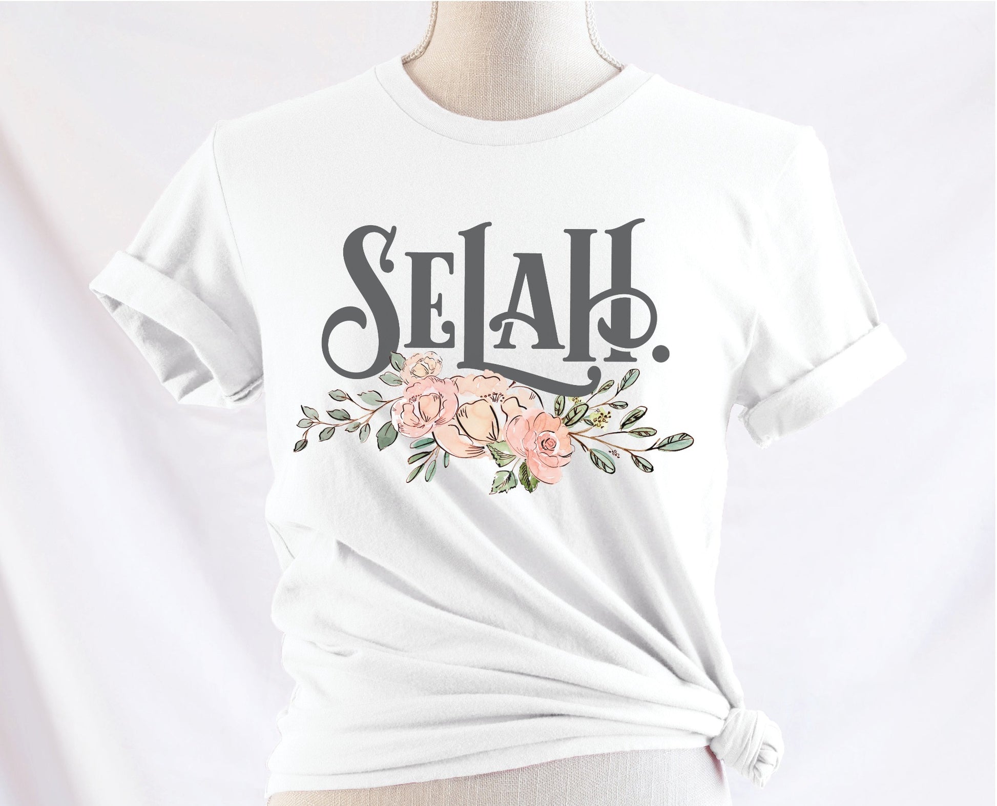 Selah Psalm bible verse watercolor floral Christian aesthetic design printed in charcoal gray, peach, blush pink, on soft white t-shirt for women