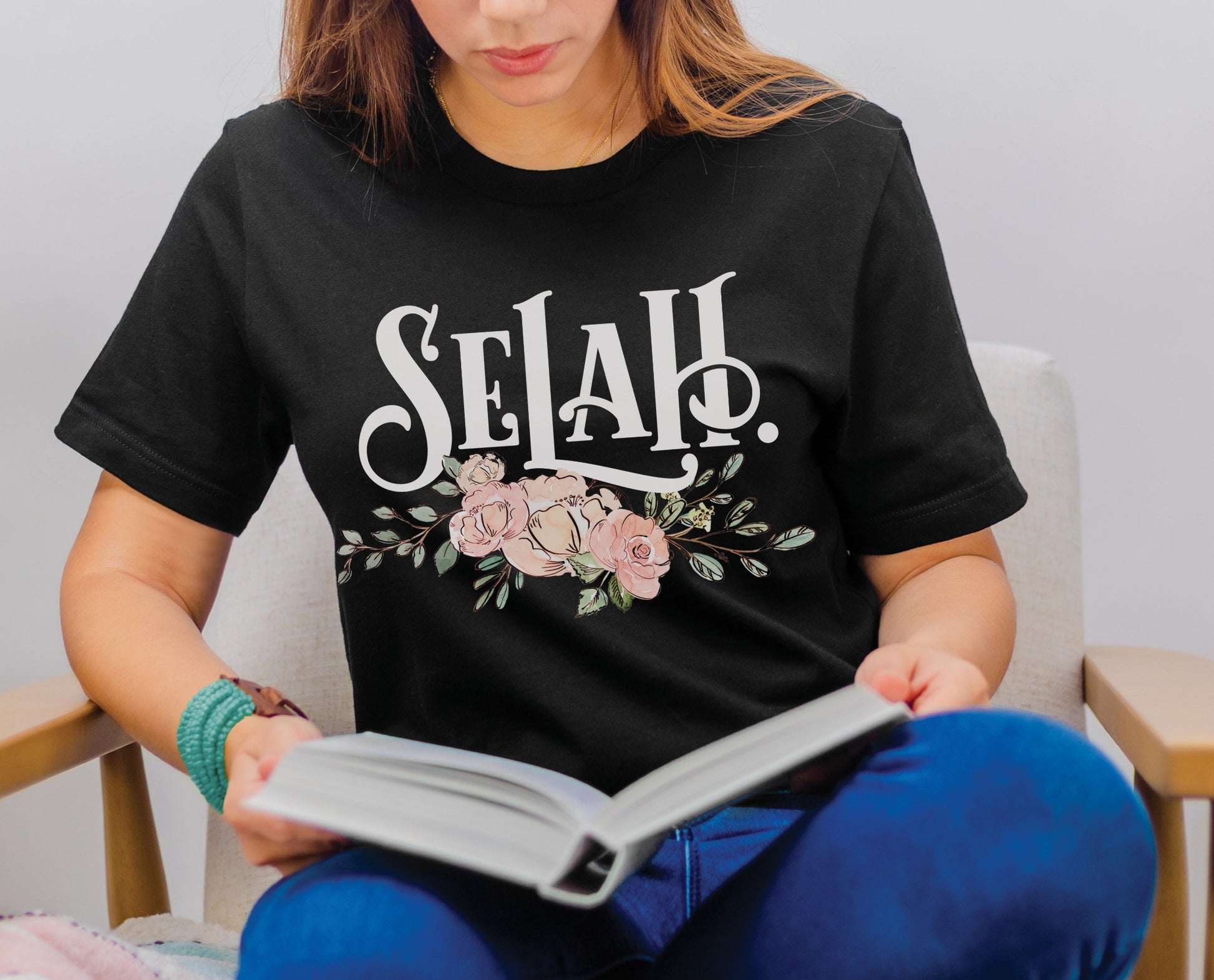 Selah Psalm bible verse watercolor floral Christian aesthetic design printed in white peach blush pink on soft black t-shirt for women