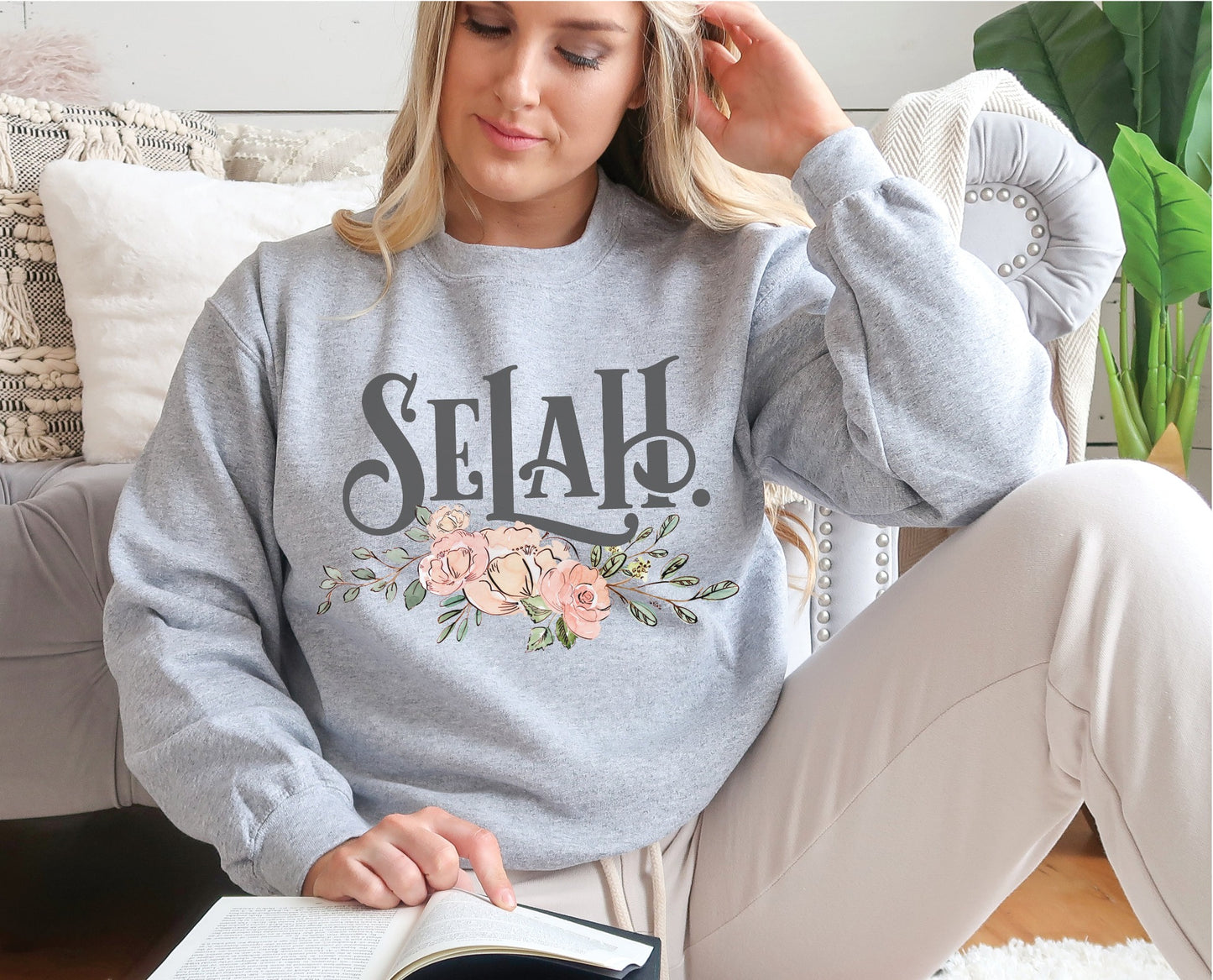 Selah Psalm watercolor floral Christian aesthetic design printed in charcoal gray, peach, blush pink, on cozy heather gray unisex crewneck sweatshirt for women