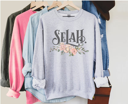 Selah Psalm watercolor floral Christian aesthetic design printed in charcoal gray, peach, blush pink, on cozy heather gray unisex crewneck sweatshirt for women