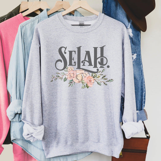 Selah Psalm watercolor floral Christian aesthetic design printed in charcoal gray, peach, blush pink, on cozy heather gray unisex crewneck sweatshirt for women