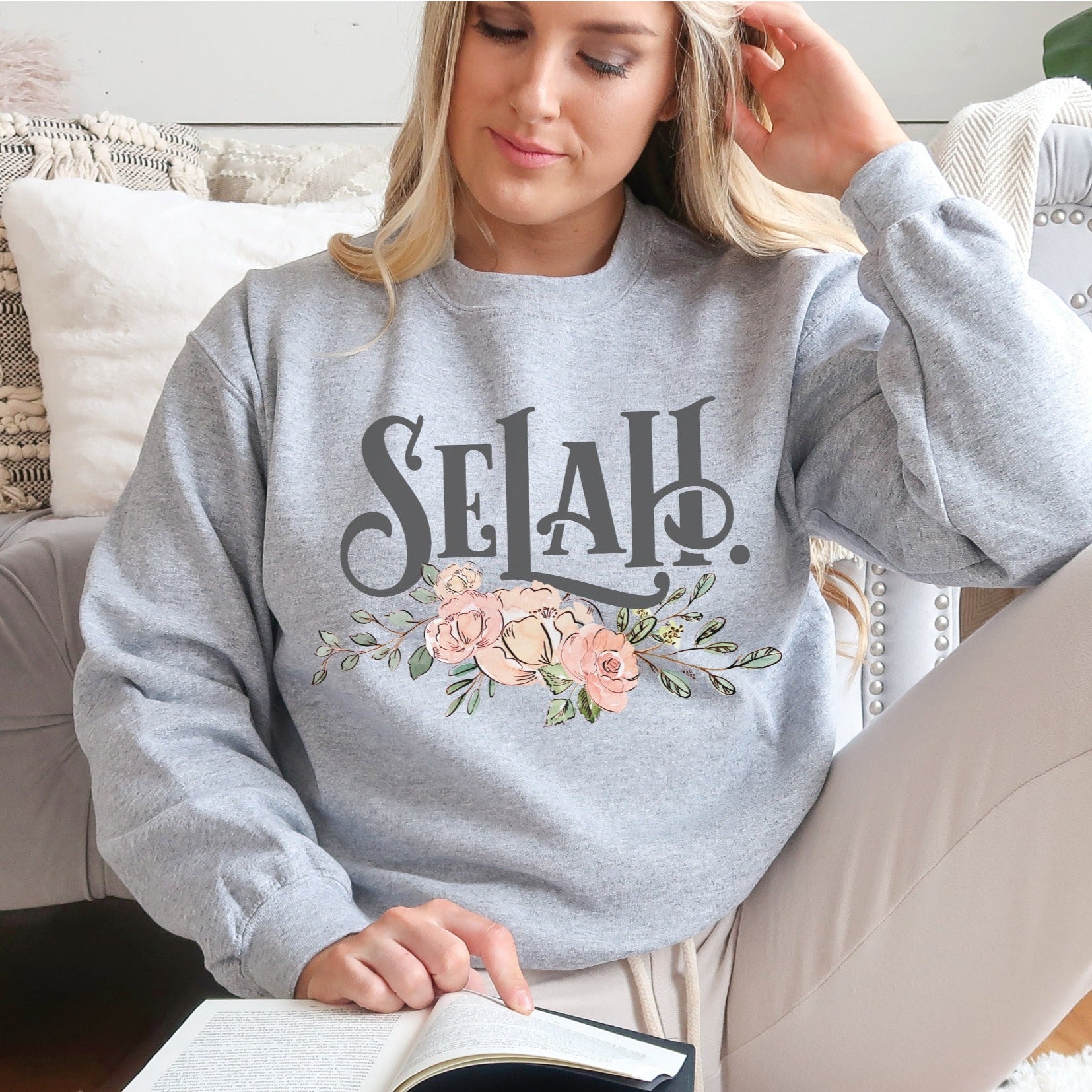Selah Psalm watercolor floral Christian aesthetic design printed in charcoal gray, peach, blush pink, on cozy heather gray unisex crewneck sweatshirt for women