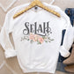 Selah Psalm watercolor floral Christian aesthetic design printed in charcoal gray, peach, blush pink, on cozy white unisex crewneck sweatshirt for women