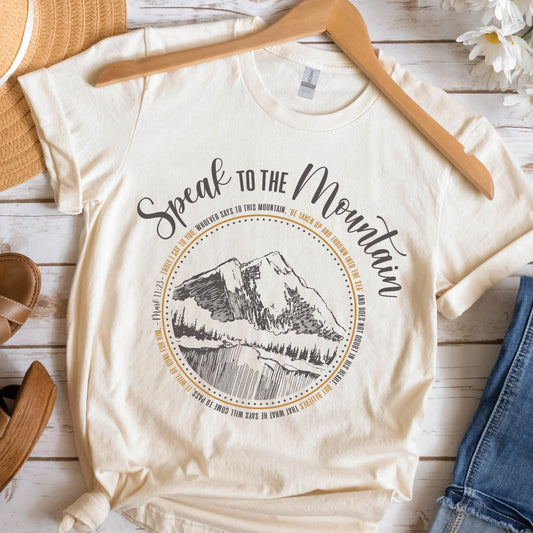 Soft Cream Speak to the Mountain Christian unisex graphic t-shirt with Mark 11:23 Whosoever Believes scripture faith-based tee, designed for women
