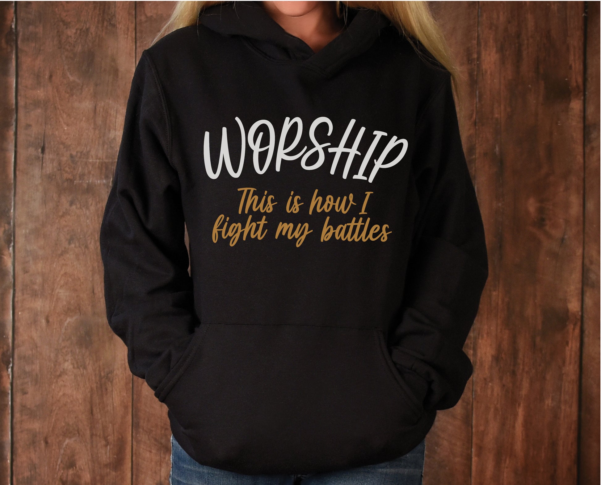 Worship This Is How I Fight My Battles Christian aesthetic design printed in white and gold on cozy soft black unisex hoodie for women and men, great gift for worship leaders