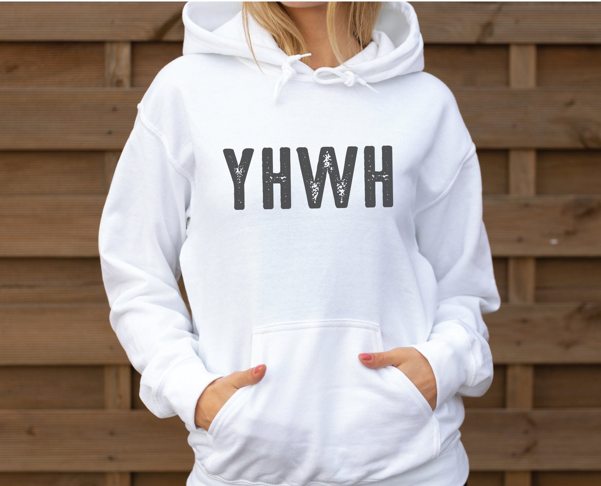 YHWH Hebrew Biblical Name of God Yahweh Christian aesthetic distressed design printed in charcoal gray on cozy white unisex hoodie sweatshirt for men and women