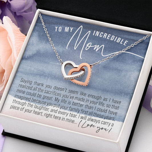 Interlocking hearts rose and white gold necklace gift for Mom with navy blue and pink watercolor message card that says "To My Incredible Mom", perfect present for Mother's Day, in jewelry gift box