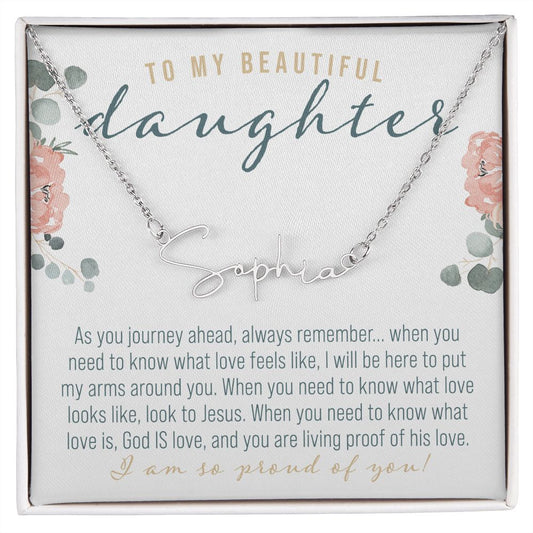 Personalized Stainless Steel Silver Name Necklace in gift box laying on top of printed message card that reads: To my beautiful daughter I am so proud of you with Christian love message