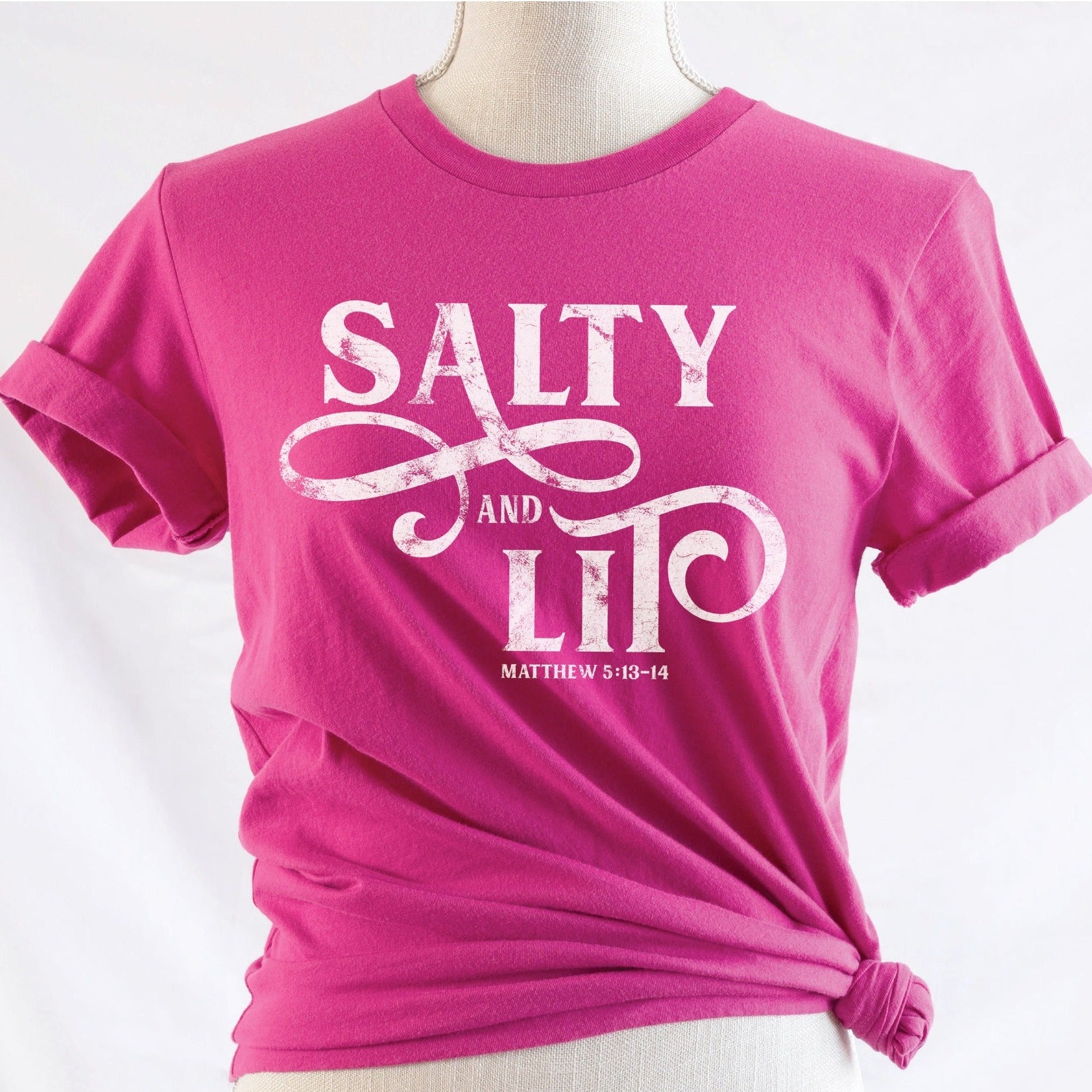 Salty And Lit Matthew 5:13-14 bible verse funny Christian T-Shirt design printed in white on soft berry hot pink tee for women
