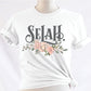 Selah Psalm bible verse watercolor floral Christian aesthetic design printed in charcoal gray, peach, blush pink, on soft white t-shirt for women